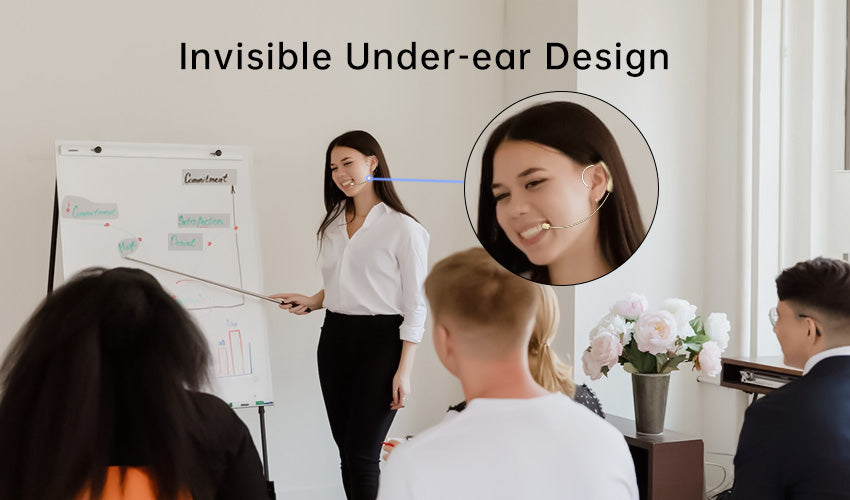 Female trainer is traing employees wearing a wireless headset microphone